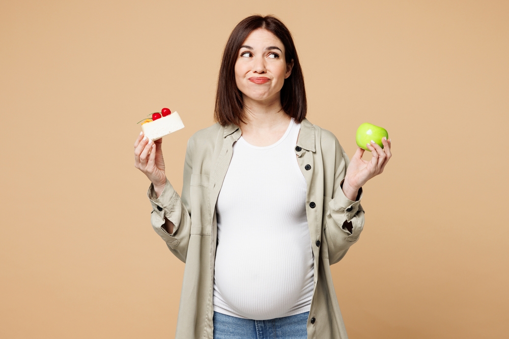 妊娠後期に甘いものを食べすぎた場合の影響について説明している画像